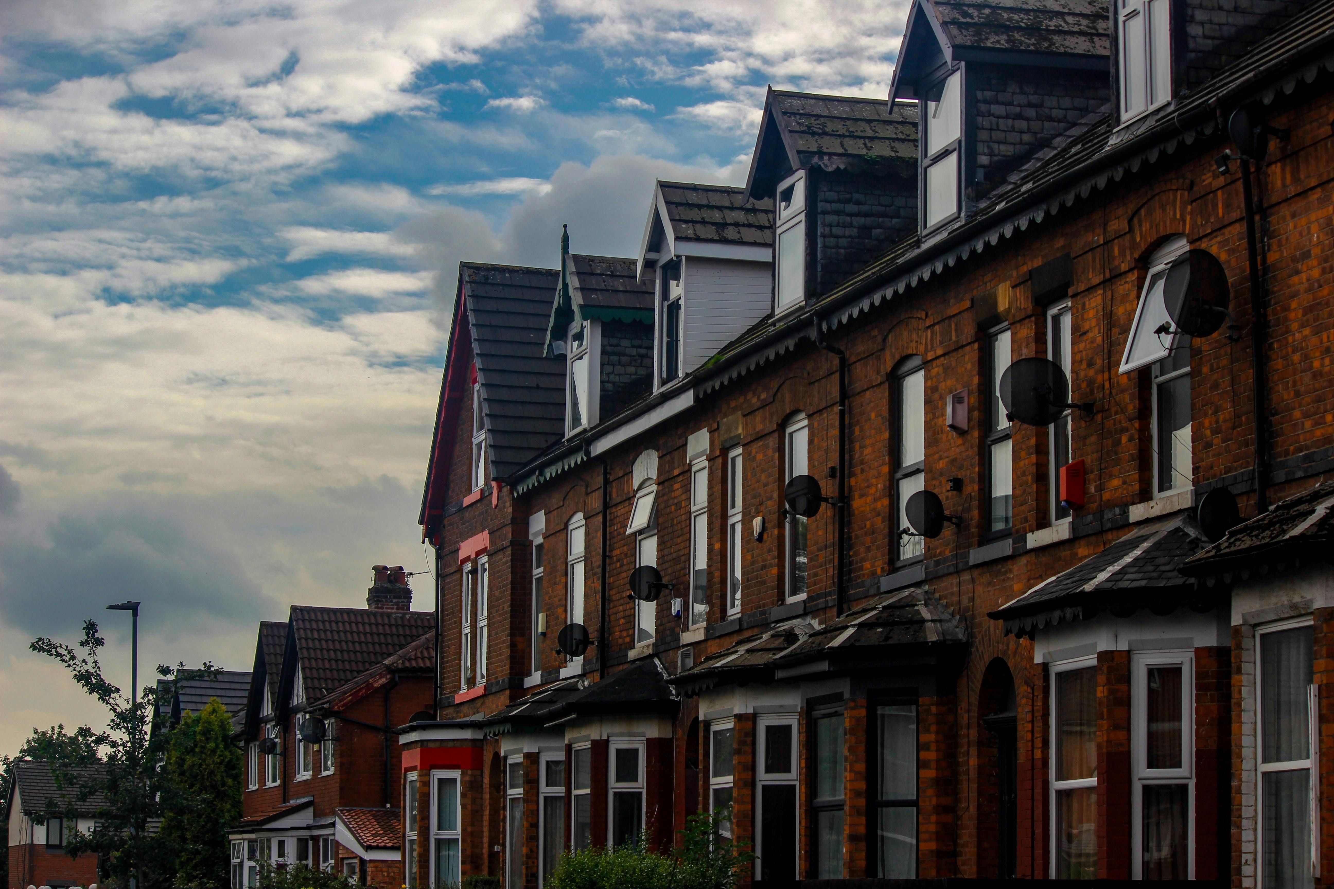 A row of traditional Victorian terraced houses with classic bay windows and brick façades, set beneath a dramatic South East London sky. These period homes reflect the architectural character so often found in Beckenham and surrounding areas, combining charm with practicality. Popular with families and professionals alike, properties like these remain highly sought-after within the London and Kent property market