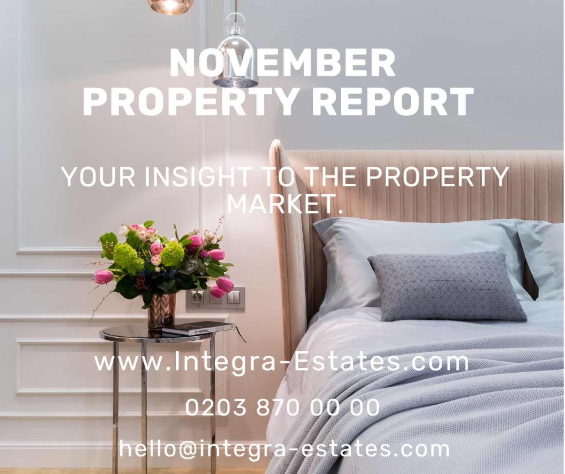 November Property Report promotional graphic by Integra Estates. The image shows a modern bedroom interior with a soft grey upholstered bed, neatly dressed with grey bedding and cushions. A round glass side table holds a vase of fresh flowers with pink and green tones, adding a touch of elegance. Overlay text reads: “November Property Report – Your insight to the property market.” Contact details for Integra Estates are displayed, including website, phone number, and email.