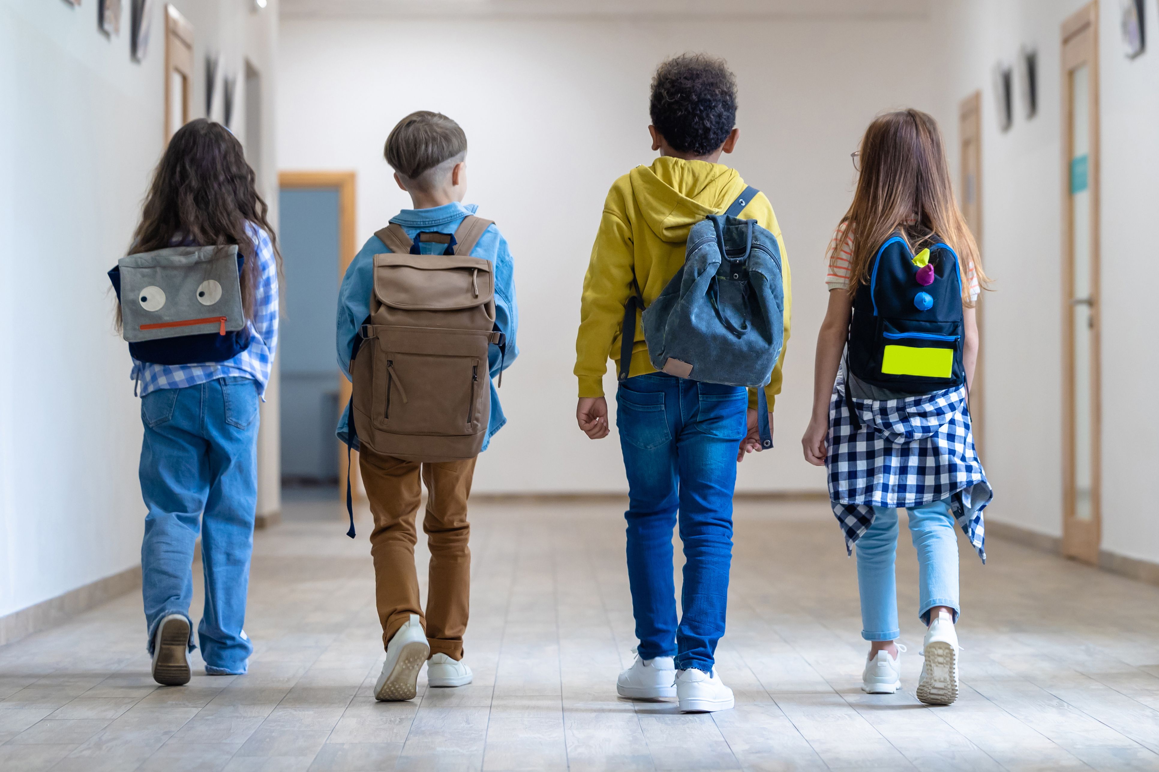 Four young children with backpacks walk together down a bright school corridor, capturing the essence of community and education in Beckenham. Local schools remain a huge attraction for families moving to the area, and with Integra Estates as trusted estate agents in Beckenham, families often ask us about the best catchments when searching for their new home. For those looking for local estate agents in Beckenham or even the nearest estate agent to me in Beckenham, we understand how important access to excellent schools is when choosing the right property